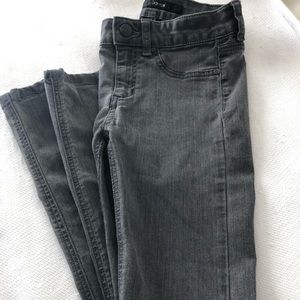 Joes jeans stonewashed black with ripped knee